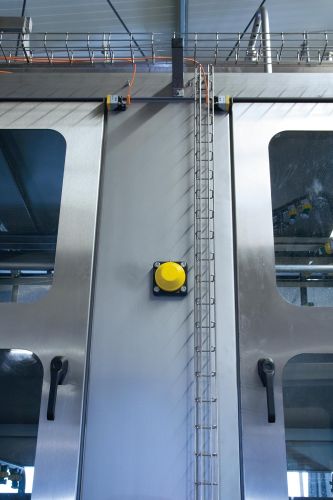 Inductive safety sensor in front of a stainless steel target.